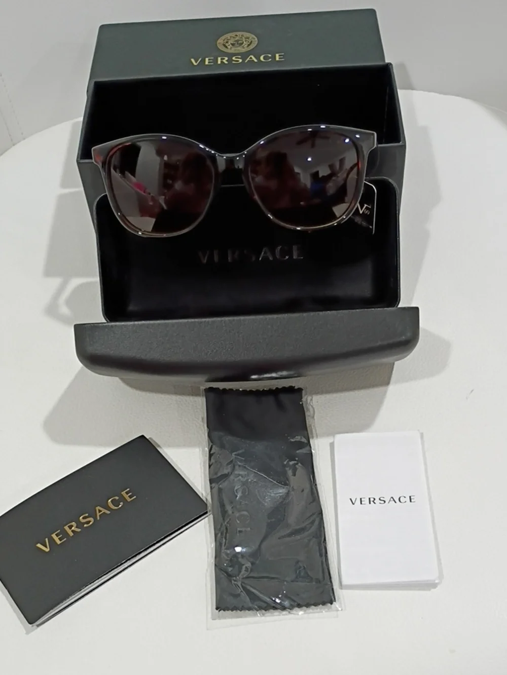 Versace Women's Black and Tortoiseshell Sunglasses with Dark Lenses